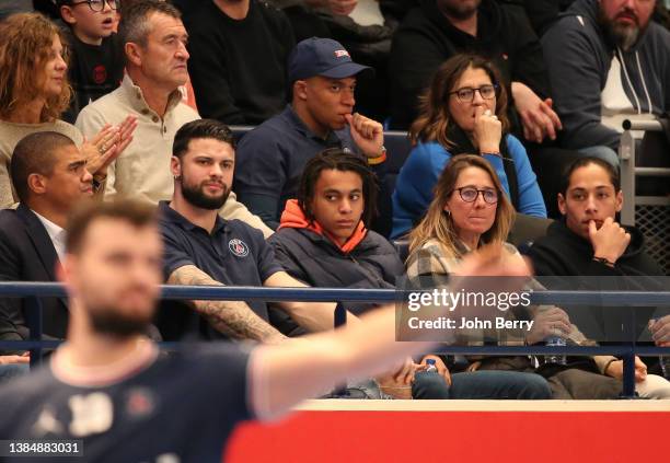 Kylian Mbappe of PSG and his mother Fayza Lamari, bottom row from left Manager of PSG Hand Daniel Narcisse, player of PSG Hand Elohim Prandi,...