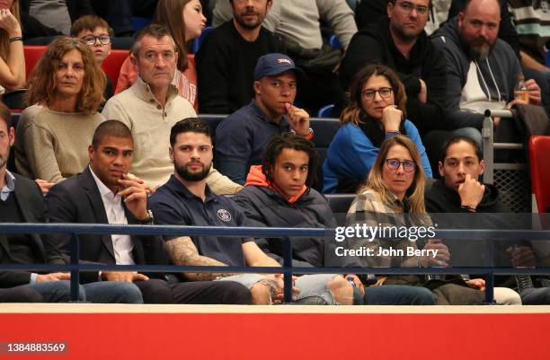 Kylian Mbappe of PSG and his mother Fayza Lamari, bottom row from left Manager of PSG Hand Daniel Narcisse, player of PSG Hand Elohim Prandi,...