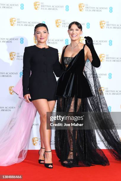 Florence Pugh and Millie Bobby Brown pose in the winners room during the EE British Academy Film Awards 2022 at Royal Albert Hall on March 13, 2022...