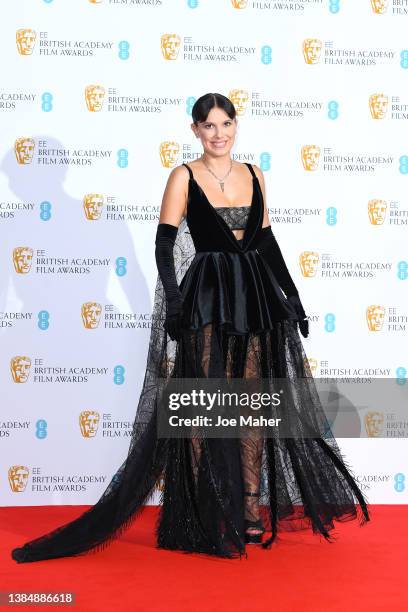 Millie Bobby Brown poses in the winners room during the EE British Academy Film Awards 2022 at Royal Albert Hall on March 13, 2022 in London, England.