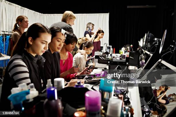 group of models backstage before fashion show - group fashion show ストックフォトと画像