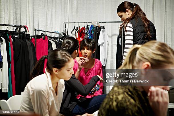 group of models backstage before fashion show - collection launch arrivals stock pictures, royalty-free photos & images