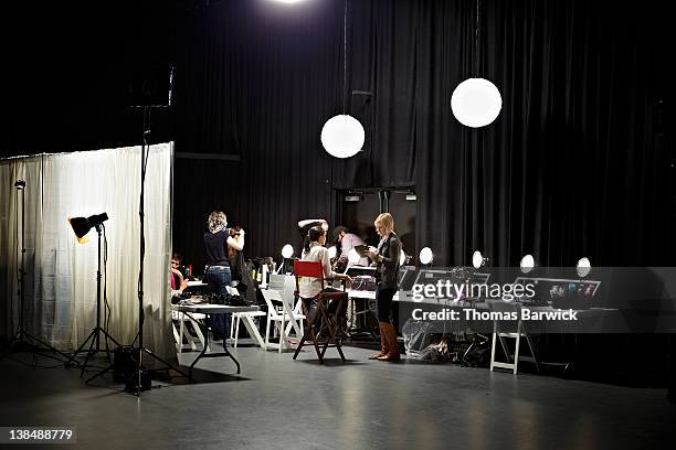 backstage preparation area of fashion show - backstage stock pictures, royalty-free photos & images