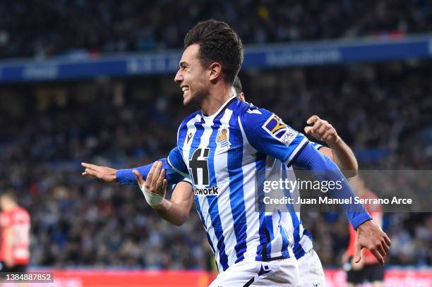 Martin Zubimendi of Real Sociedad celebrates scoring their side's first goal during the LaLiga Santander match between Real Sociedad and Deportivo...