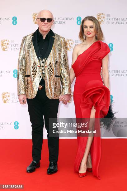 John Caudwell and Modesta Vzesniauskaite attend the EE British Academy Film Awards 2022 at Royal Albert Hall on March 13, 2022 in London, England.