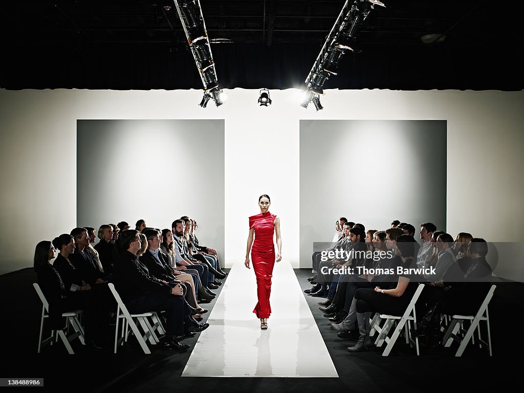Model In Gown Walking Down Catwalk At Fashion Show High-Res Stock Photo -  Getty Images