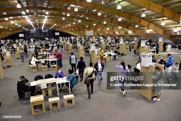 Colombian citizens cast their vote during the Legislative Elections on March 13, 2022 in Bogota, Colombia. Around 38 million of Colombians are...