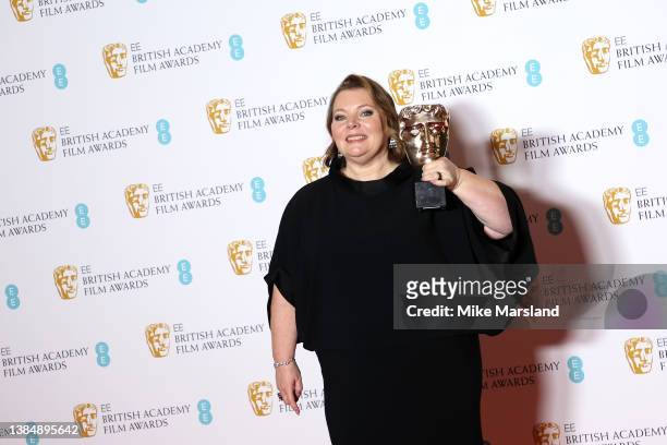Joanna Scanlan poses in the winners room with the award for Best Actress for "After Love during the EE British Academy Film Awards 2022 at Royal...