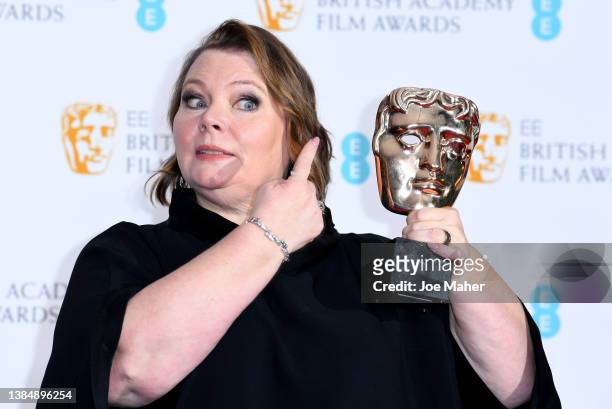Joanna Scanlan poses in the winners room with the award for Best Actress for "After Love" during the EE British Academy Film Awards 2022 at Royal...