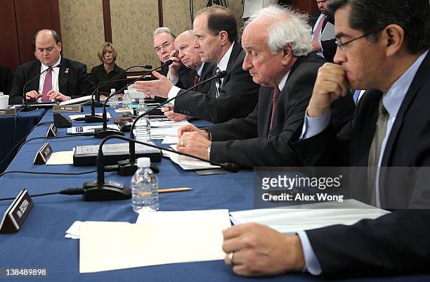 Members of the House-Senate Conference Committee on how to extend the payroll tax cut, U.S. Rep. Dave Camp speaks as Rep. Tom Reed , Rep. Tom Price ,...