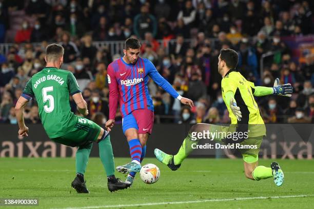 Ferran Torres of FC Barcelona scores their team's second goal during the LaLiga Santander match between FC Barcelona and CA Osasuna at Camp Nou on...