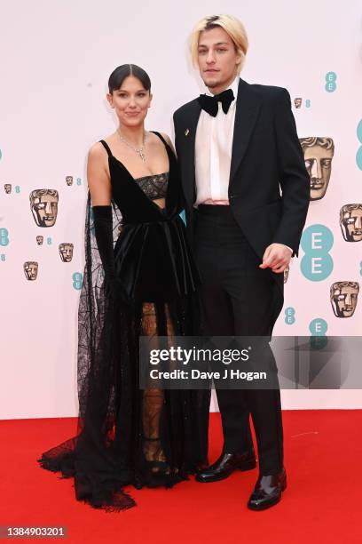 Millie Bobby Brown and Jake Bongiovi attend the EE British Academy Film Awards 2022 at Royal Albert Hall on March 13, 2022 in London, England.