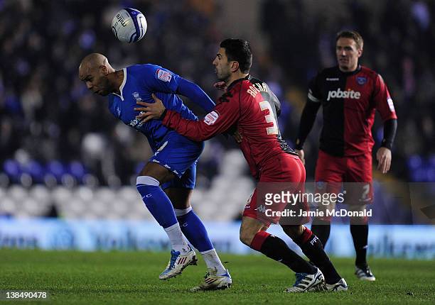 Marlon King of Birmingham City battles with Ricardo Rocha of Portsmouth during the npower Championship match between Birmingham City and Portsmouth...
