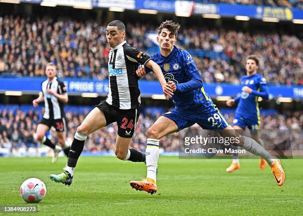 Miguel Almiron of Newcastle United holds off Kai Havertz of Chelsea during the Premier League match between Chelsea and Newcastle United at Stamford...