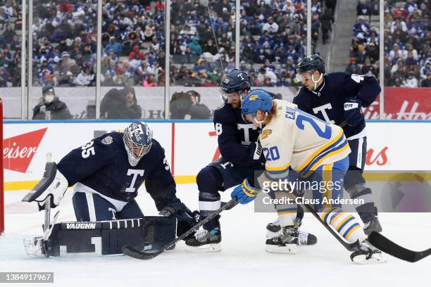 Petr Mrazek of the Toronto Maple Leafs blocks a shot by Cody Eakin of the Buffalo Sabres in the second period during the Heritage Classic at Tim...