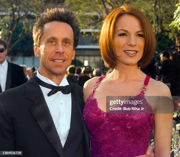 Brian Grazer and Gigi Levangie arrive at Academy Awards Show, March 25, 1996 in Los Angeles, California.