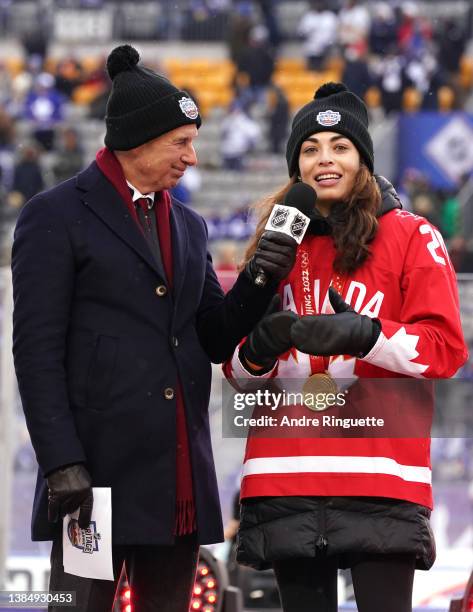 Sarah Nurse of the Canadian Women's National Hockey team speaks to the stadium fans before the third period of the 2022 Tim Hortons NHL Heritage...