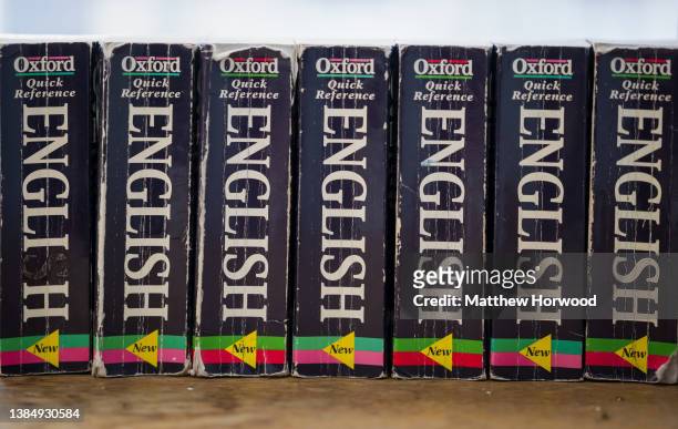 Row of Oxford English dictionaries in a school classroom on February 11, 2022 in Cardiff, Wales.