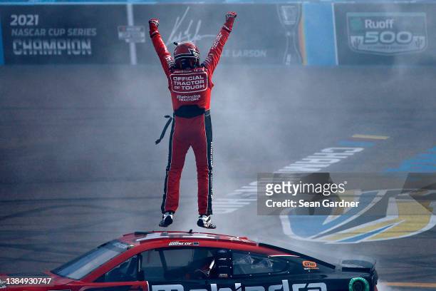 Chase Briscoe, driver of the Mahindra Tractors Ford, celebrates after winning the Ruoff Mortgage 500 at Phoenix Raceway on March 13, 2022 in...