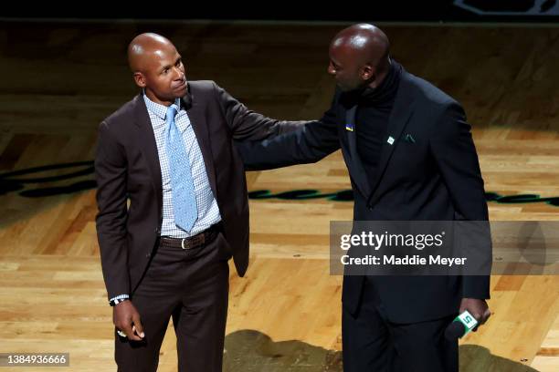 Former Boston Celtics player Ray Allen embraces Kevin Garnett during Garnett's number retirement ceremony following the game between the Boston...