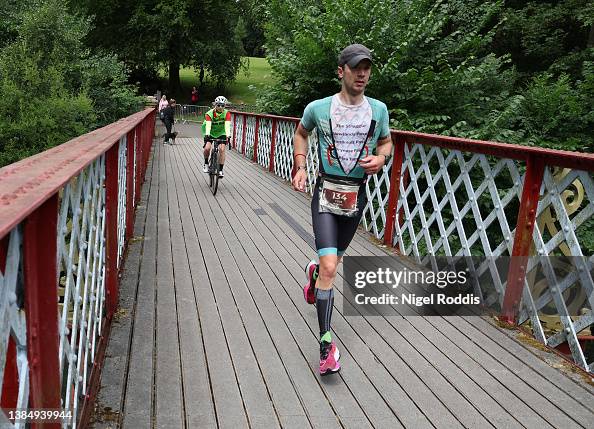 Ted Rigby Tom Rigby of Great Britain competes in the run section of Ironman UK ...