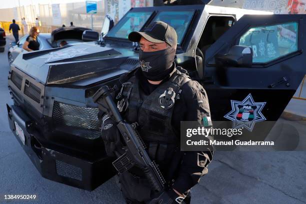Police officer stands guard prior the 10th round match between Santos Laguna and Club Tijuana as part of the Torneo Grita Mexico C22 Liga MX at...