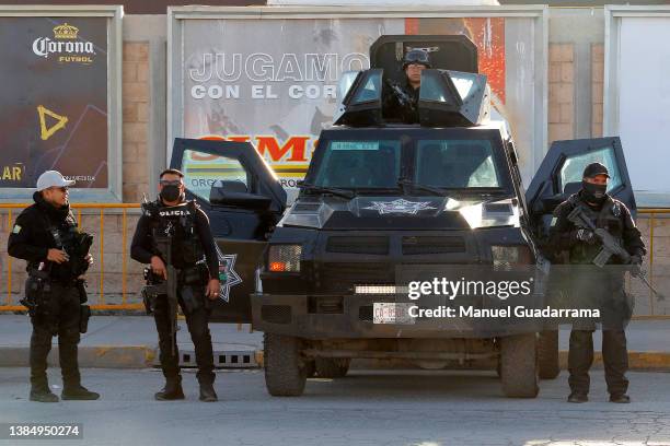 Police officers stand guard prior the 10th round match between Santos Laguna and Club Tijuana as part of the Torneo Grita Mexico C22 Liga MX at...