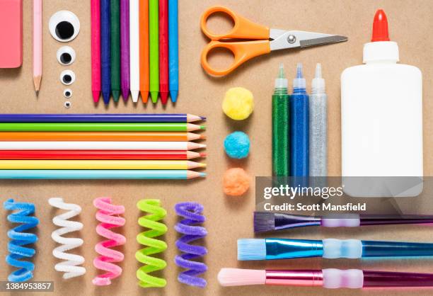 colorful art and craft supplies neatly arranged - google eyes stock pictures, royalty-free photos & images