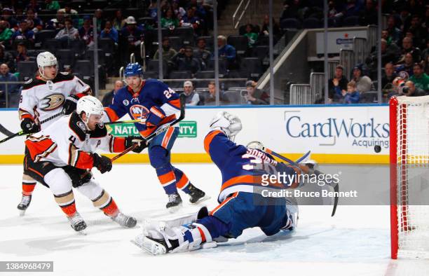 Ilya Sorokin of the New York Islanders makes a third period save on Cam Fowler of the Anaheim Ducks at the UBS Arena on March 13, 2022 in Elmont, New...