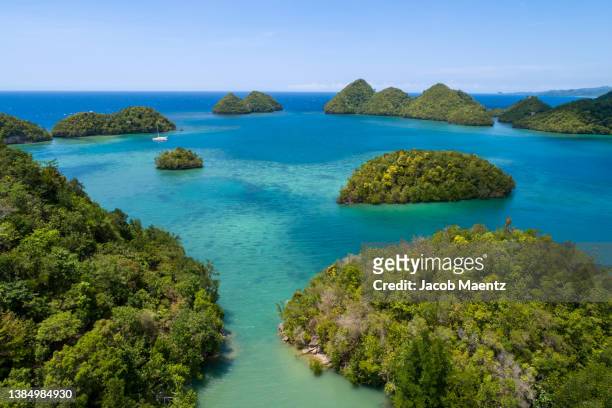 coastal waters of sipalay, negros occidental, philippines. - negros_(philippines) stock pictures, royalty-free photos & images