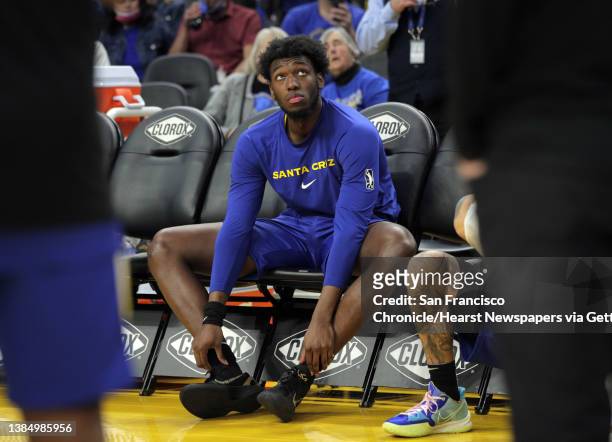 James Wiseman on the bench before he is introduced before the Santa Cruz Warriors played the G League Ignite at Chase Center in San Francisco,...