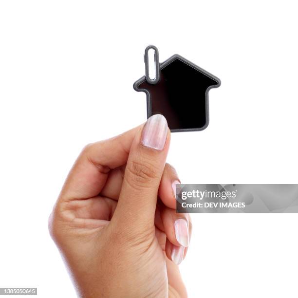 woman hand holding house - small square stock pictures, royalty-free photos & images