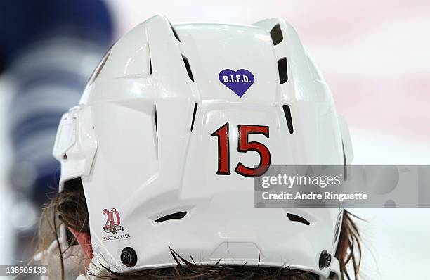 Zack Smith of the Ottawa Senators wears a special decal on the back of his helmet on Do It For Daron Youth Mental Health Awareness Night against the...