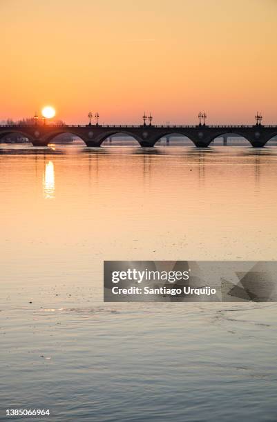 pont de pierre at sunrise - garonne stock pictures, royalty-free photos & images