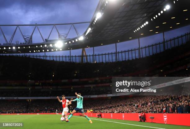 General view as Marc Albrighton of Leicester City tackles Kieran Tierney of Arsenal during the Premier League match between Arsenal and Leicester...