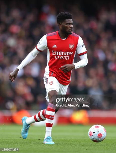 Thomas Partey of Arsenal during the Premier League match between Arsenal and Leicester City at Emirates Stadium on March 13, 2022 in London, England.