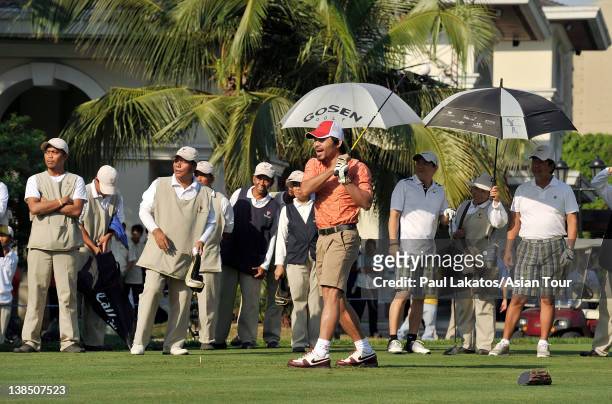 Filipino professional boxer and politician Manny Pacquiao tees off during the Pro-am event ahead of the ICTSI Philippine Open at Wack Wack Golf and...