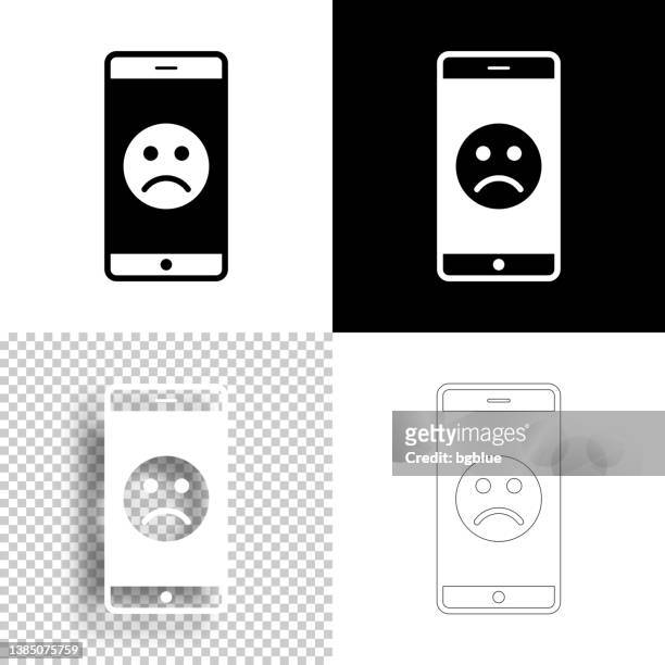 smartphone with sad emoji. icon for design. blank, white and black backgrounds - line icon - disappointing phone stock illustrations