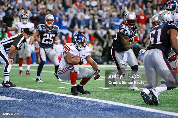 Super Bowl XLVI: New York Giants Ahmad Bradshaw in action, falling into endzone for game-winning touchdown vs New England Patriots during 4th quarter...