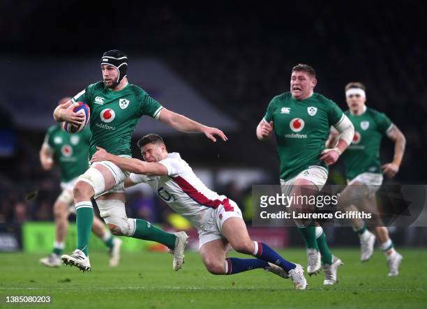 Caelan Doris of Ireland is tackled Ben Youngs of England during the Guinness Six Nations Rugby match between England and Ireland at Twickenham...
