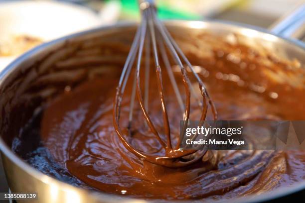 close up view of brownie mix being prepared with whisk in restaurant kitchen. - chocolate cake 個照片及圖片檔