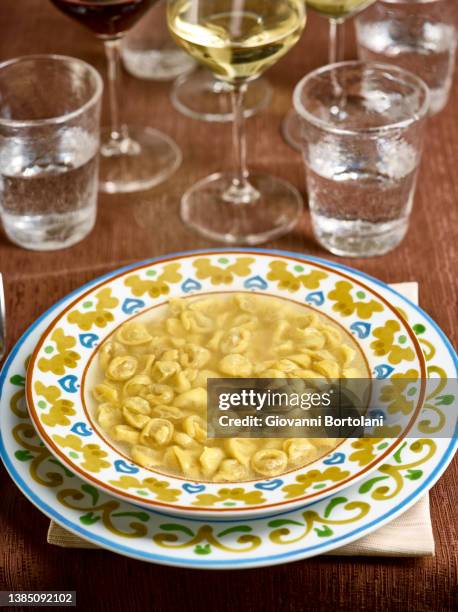 typical italian dish, on the restaurant table - tortellini stock pictures, royalty-free photos & images
