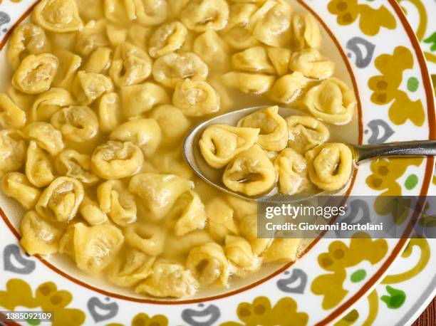 typical italian dish, with spoon - caldo fotografías e imágenes de stock