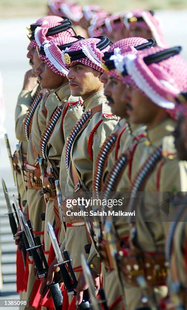 Jordanian honor guard greets President of the Democratic Republic of Congo Joseph Kabila at Marka military airport September 16, 2002 in Amman,...