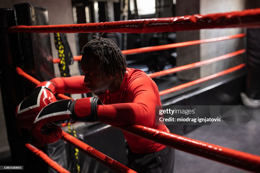 Boxer On Ropes Tired Male Boxer Black Ethnicity Leaning On Rope Of The Boxing Ring ...