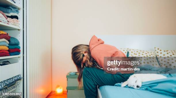 woman with stomach pain staying home - nausea bildbanksfoton och bilder