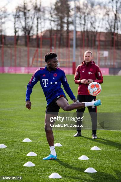 Alphonso Davies of FC Bayern Muenchen controls the ball during a rehabilitation training session at Saebener Strasse training ground on March 14,...