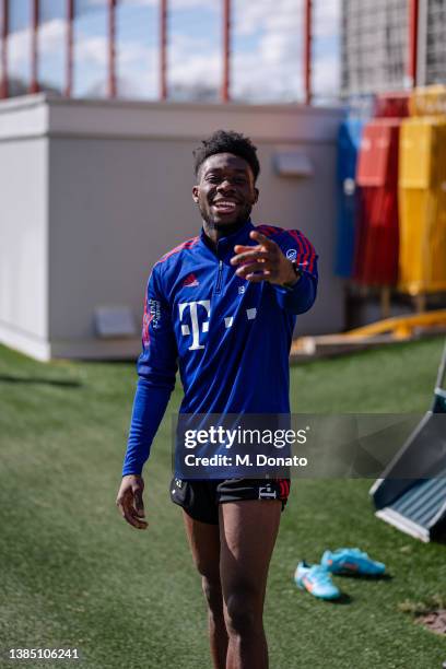 Alphonso Davies of FC Bayern Muenchen talks to the photographer during a rehabilitation training session at Saebener Strasse training ground on March...