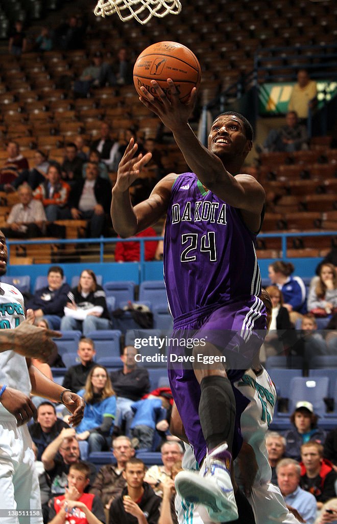 Edwin Ubiles Edwin Ubiles from the Dakota Wizards takes the ball to the basket ...