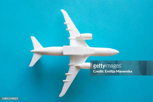 airplane on blue background - model airplane ストックフォトと画像